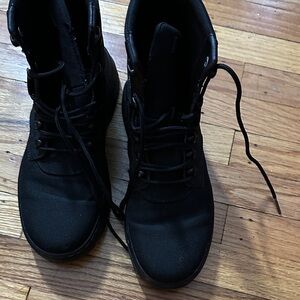 Dr. Martens Black Lace-Up Boots with Yellow Accents